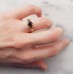 Μονόπετρο δαχτυλίδι από ροζ χρυσό Κ14 με μαύρα ζιργκόν